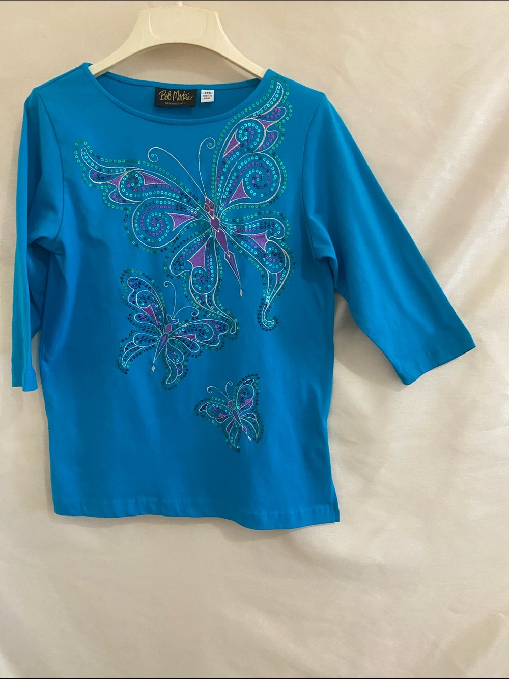 Bob Mackie woman’s Turquoise Butterfly 3/4 Sleeve Top